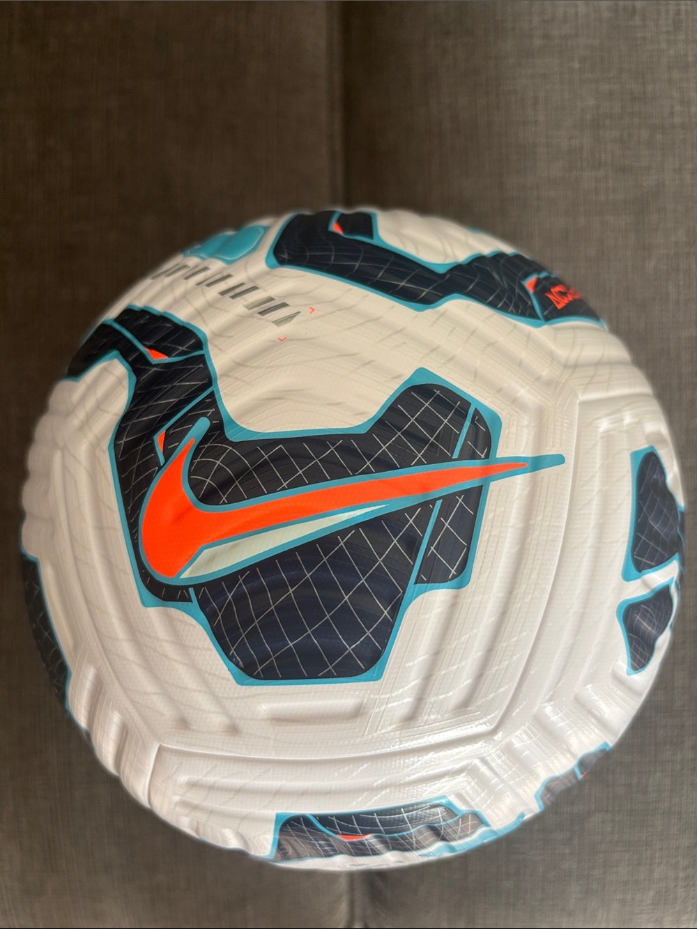 Nike White Soccer Ball with Navy Panels and Orange Swoosh